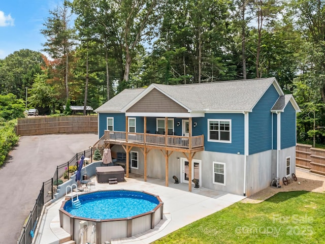 35 Dawson Steele Ct, Asheville, NC 28803 - back of house featuring a hot tub, a shingled roof, a deck, a patio, and stairs