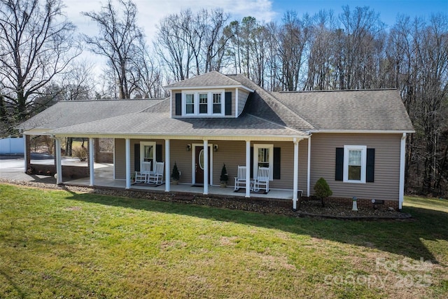 view of front of house with a porch and a front yard