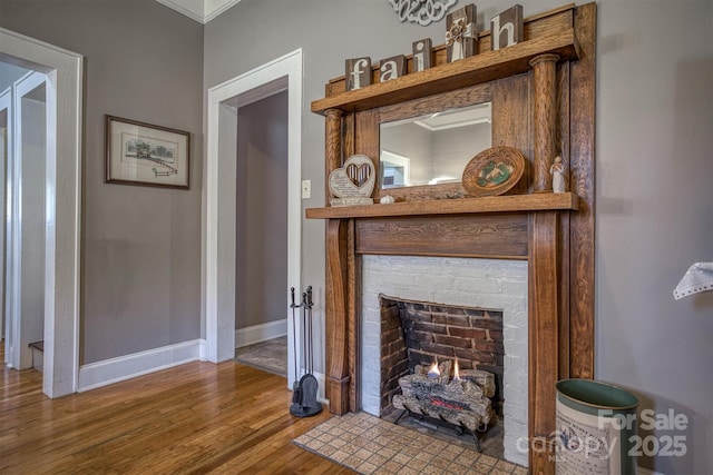 interior space with crown molding and hardwood / wood-style floors