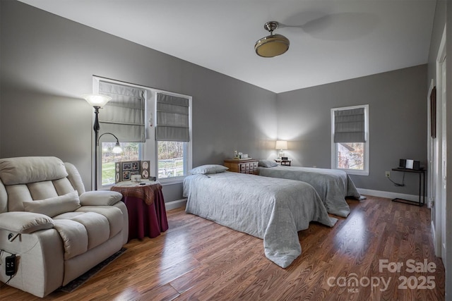 bedroom featuring dark hardwood / wood-style floors