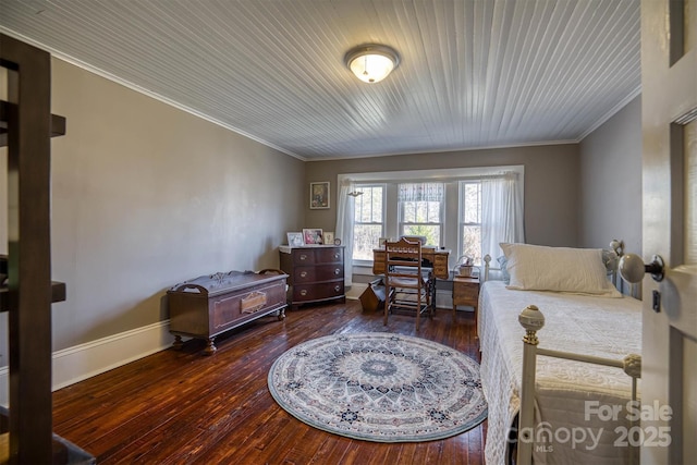 bedroom featuring crown molding and hardwood / wood-style floors