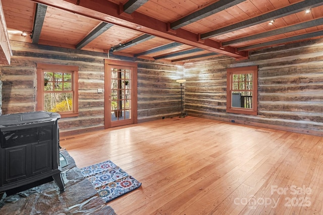 14 Woods Rd, Fairview, NC 28730 - living room with a wood ceiling with exposed beams, a wood stove, and hardwood / wood-style floors