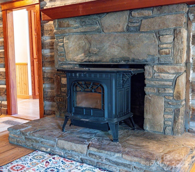 14 Woods Rd, Fairview, NC 28730 - detailed view of a wood stove and wood finished floors