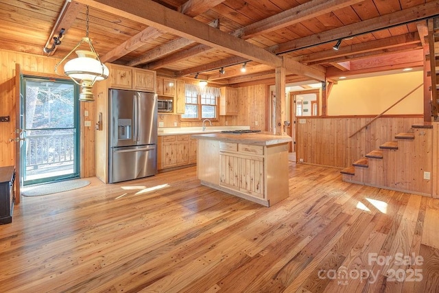14 Woods Rd, Fairview, NC 28730 - kitchen featuring stainless steel appliances, track lighting, a wood ceiling with exposed beams, wooden walls, and light wood-style floors