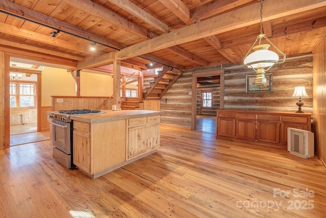 14 Woods Rd, Fairview, NC 28730 - kitchen with gas range, a wood ceiling with exposed beams, log walls, healthy amount of natural light, and light wood finished floors