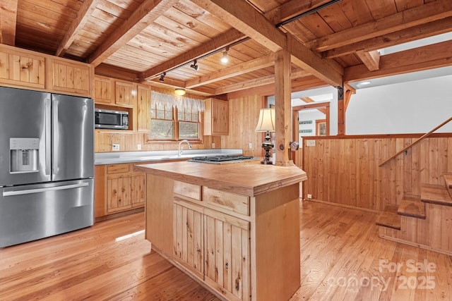 14 Woods Rd, Fairview, NC 28730 - kitchen with appliances with stainless steel finishes, light brown cabinets, butcher block counters, a wooden ceiling with exposed beams, and wood walls