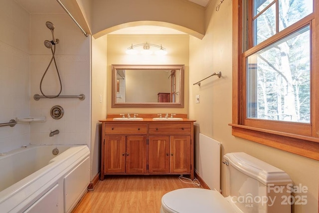 14 Woods Rd, Fairview, NC 28730 - full bath with shower / bathtub combination, double vanity, wood finished floors, and plenty of natural light