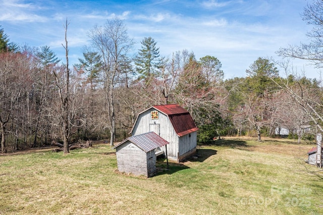 14 Woods Rd, Fairview, NC 28730 - view of green lawn featuring a storage shed