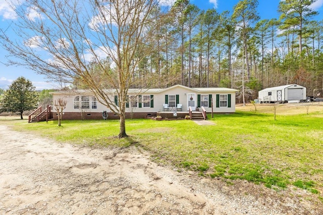 view of front of property with a front yard