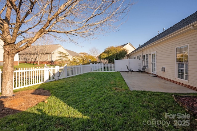 view of yard with a patio area and a fenced backyard