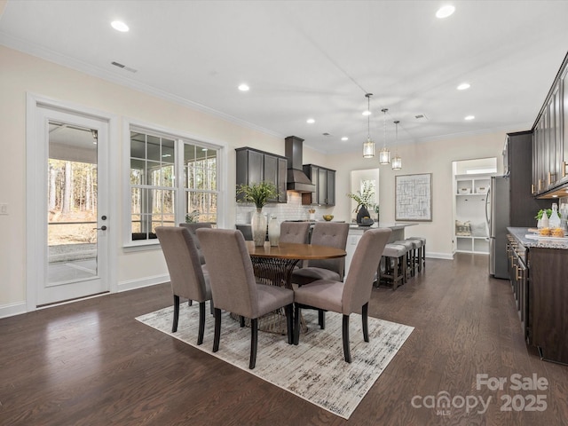 dining space with baseboards, ornamental molding, dark wood-type flooring, and recessed lighting