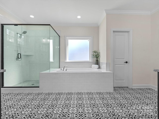 full bathroom featuring ornamental molding, a garden tub, and a shower stall