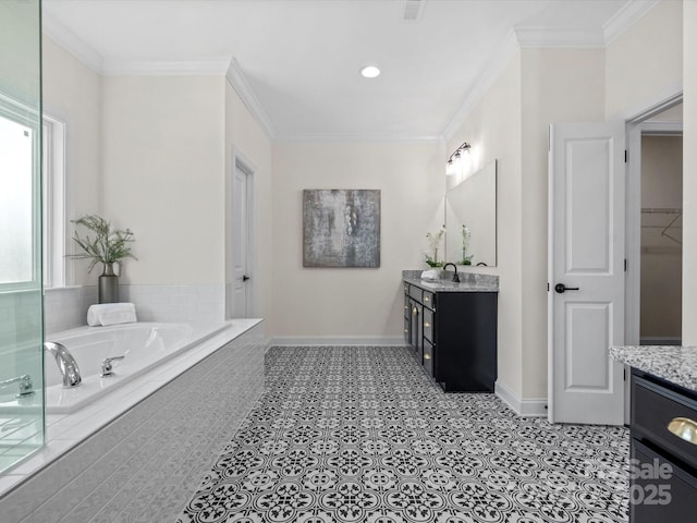 bathroom with ornamental molding and vanity