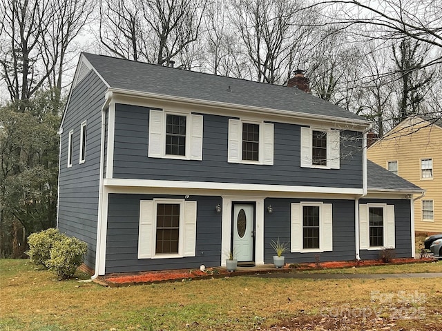4922 Rivergreen Ln, Charlotte, NC 28227 - colonial home with a chimney and a front lawn