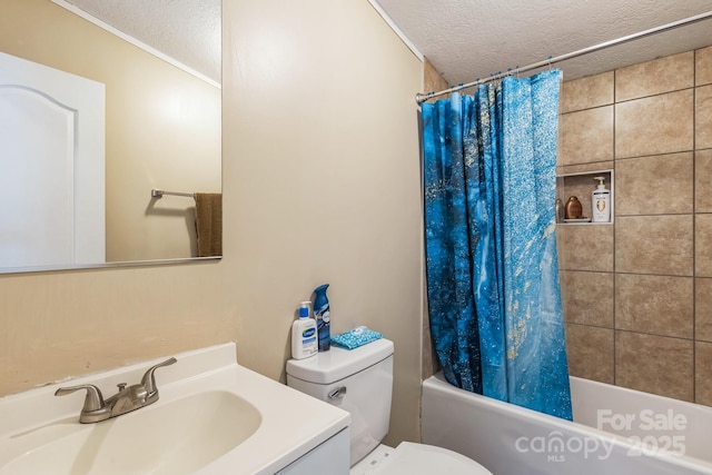 full bathroom featuring toilet, vanity, a textured ceiling, and shower / tub combo