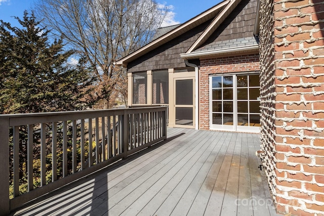 wooden terrace with a sunroom