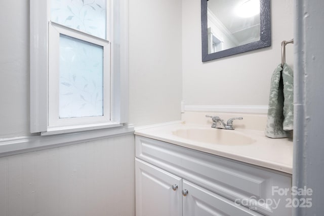 bathroom featuring wainscoting and vanity