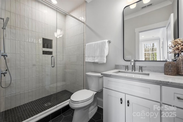 full bath with tile patterned flooring, toilet, vanity, visible vents, and a stall shower