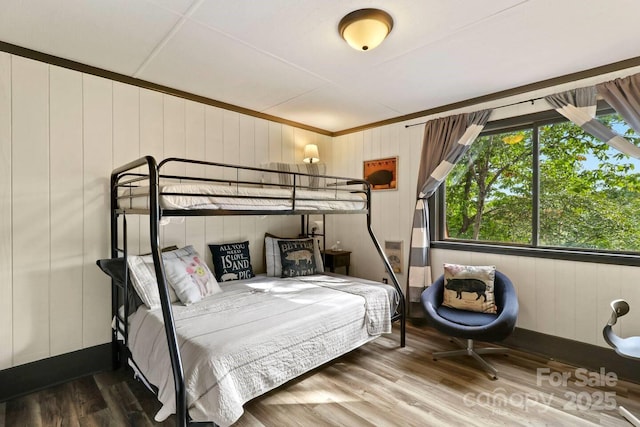 bedroom featuring wood-type flooring