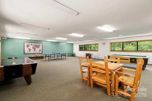 recreation room with carpet flooring, billiards, and a textured ceiling