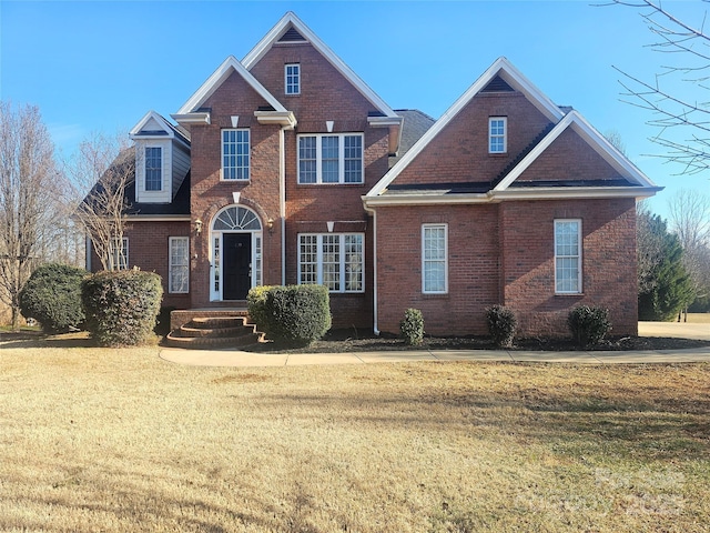 view of front of home featuring a front lawn