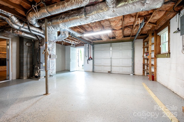 garage featuring heating unit