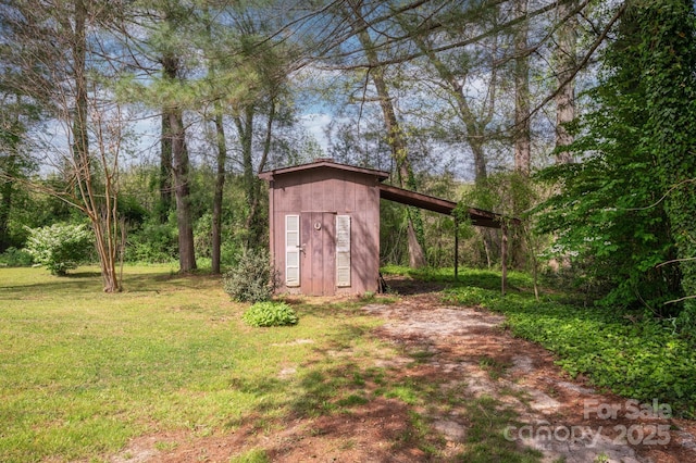 view of shed featuring a carport