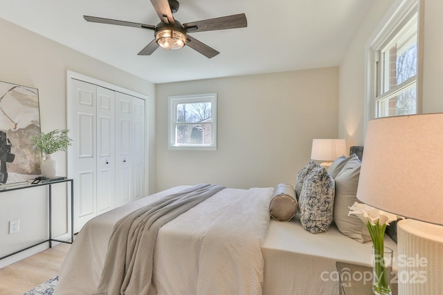 bedroom featuring a ceiling fan and a closet