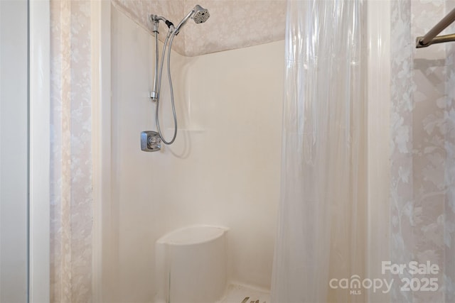 bathroom with walk in shower