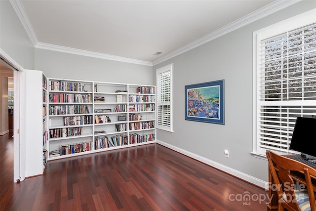 sitting room featuring crown molding, baseboards, and wood finished floors