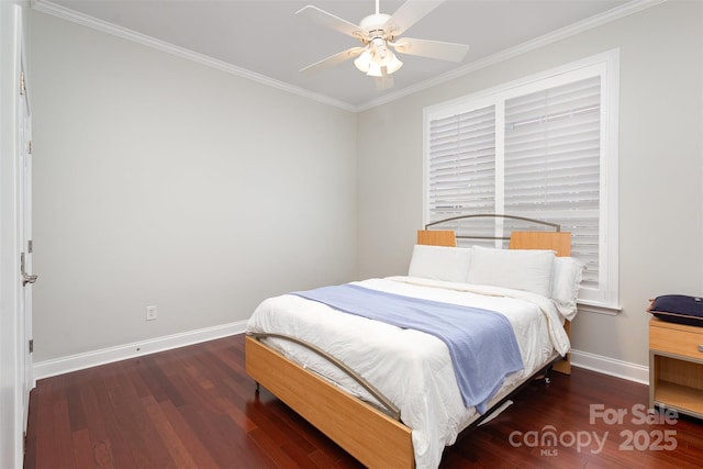 bedroom featuring a ceiling fan, baseboards, dark wood finished floors, and crown molding