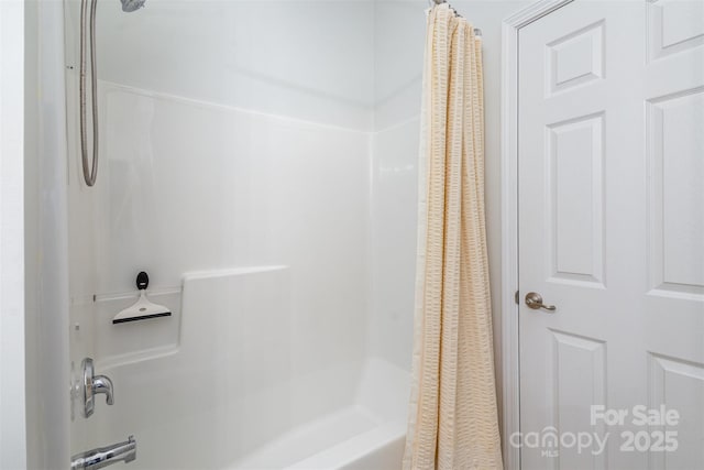 full bathroom with shower / bath combination with curtain