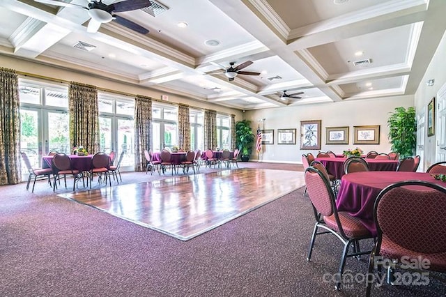 carpeted dining space featuring french doors, beamed ceiling, plenty of natural light, and coffered ceiling