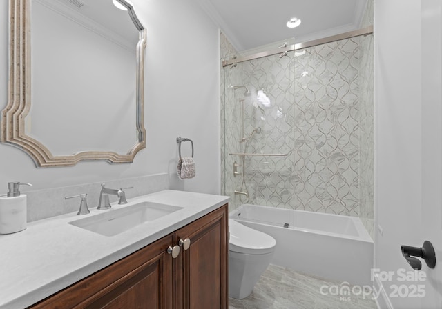 full bathroom featuring toilet, crown molding, combined bath / shower with glass door, and vanity