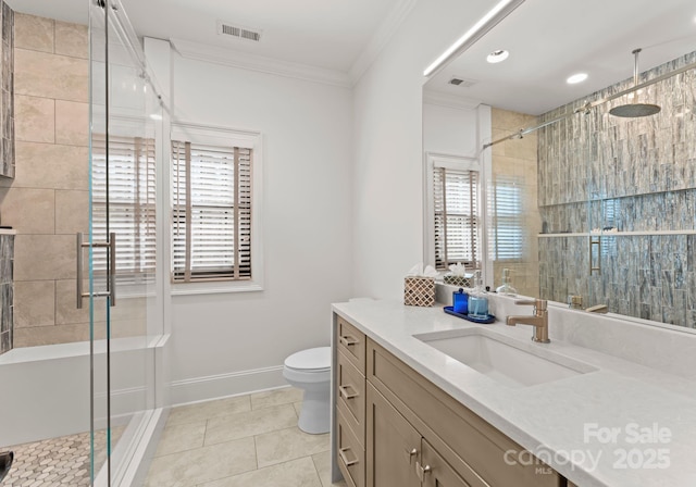 bathroom featuring an enclosed shower, tile patterned floors, toilet, vanity, and crown molding