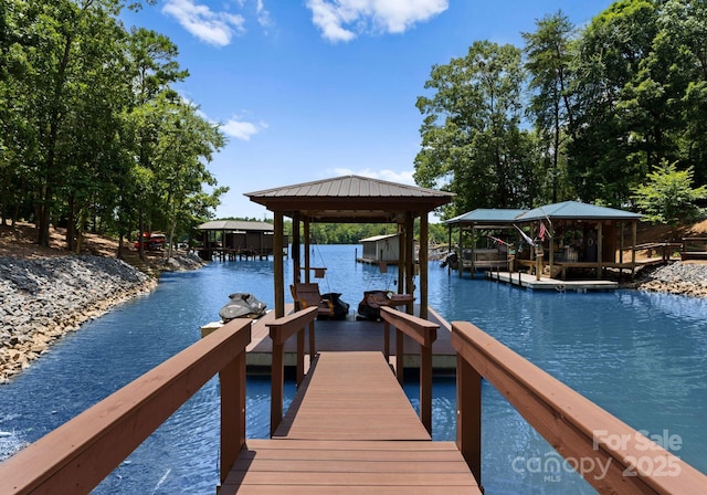 dock area featuring a water view