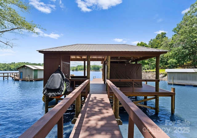 dock area featuring a water view