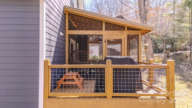 deck featuring a sunroom