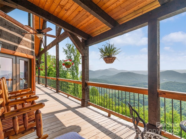 wooden terrace with a mountain view