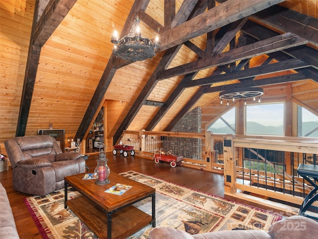 living room featuring wood ceiling, hardwood / wood-style floors, an inviting chandelier, high vaulted ceiling, and beam ceiling