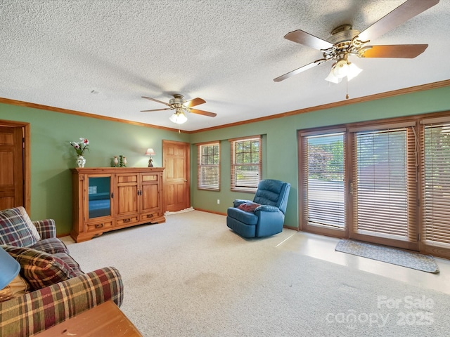 2988 Parks Lafferty Rd, Concord, NC 28025 - living room featuring ceiling fan, crown molding, carpet flooring, baseboards, and a textured ceiling