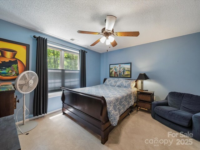 2988 Parks Lafferty Rd, Concord, NC 28025 - bedroom featuring carpet, a textured ceiling, a ceiling fan, and baseboards