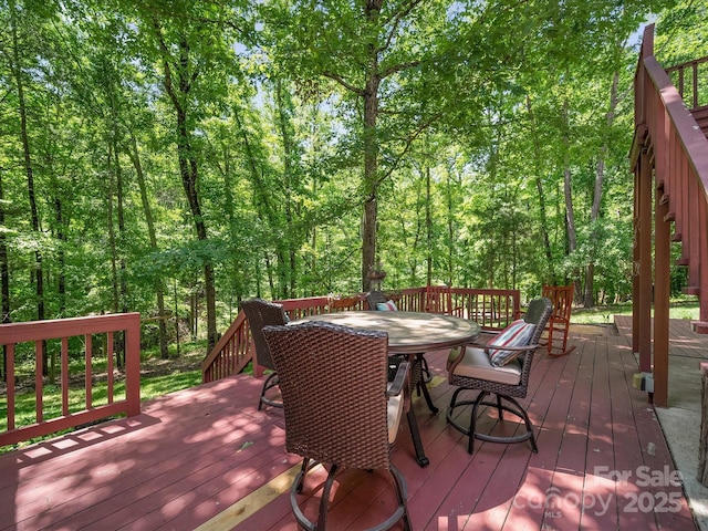 2988 Parks Lafferty Rd, Concord, NC 28025 - wooden deck featuring outdoor dining area and a view of trees