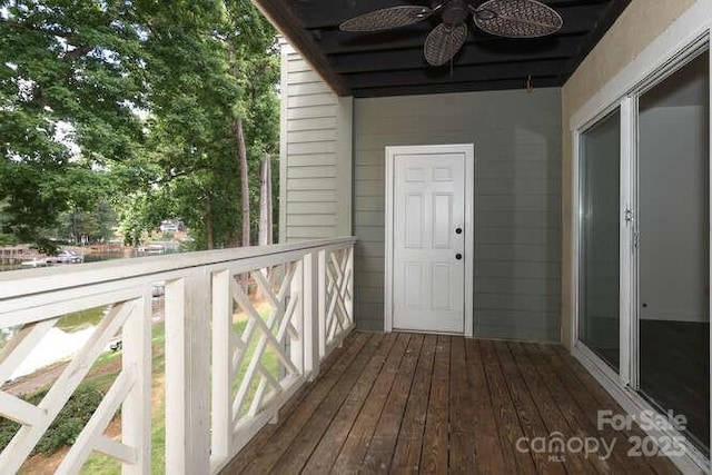 exterior space featuring ceiling fan