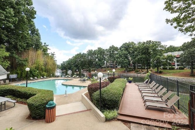 view of pool featuring a patio area