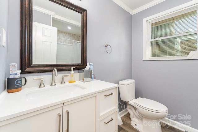 bathroom with toilet, vanity, hardwood / wood-style floors, crown molding, and a shower with shower curtain