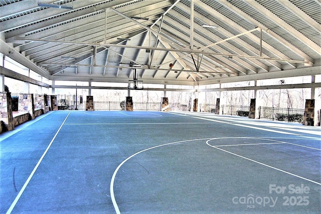 view of sport court featuring community basketball court and fence