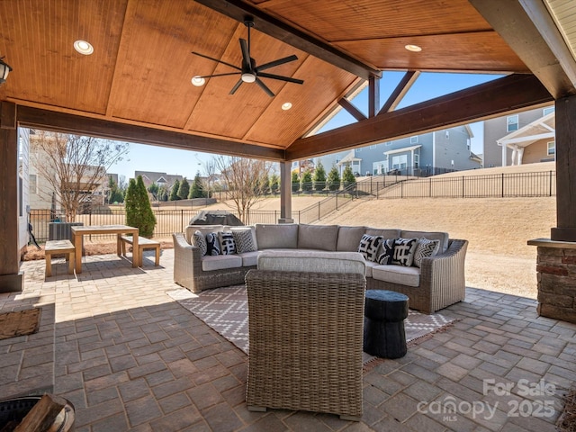 view of patio with a fenced backyard and outdoor lounge area