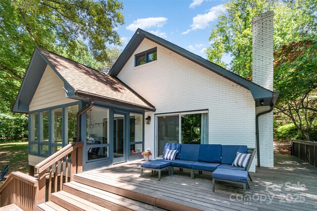 353 Whippoorwill Rd, Mooresville, NC 28117 - deck featuring a sunroom and an outdoor hangout area