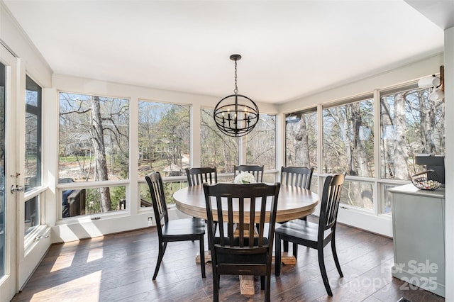 353 Whippoorwill Rd, Mooresville, NC 28117 - sunroom / solarium featuring wood finished floors and a chandelier